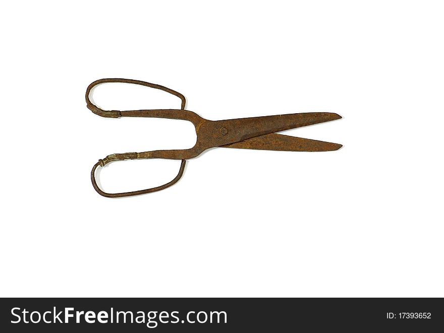 Vintage rusty forged scissors isolated on white background. Vintage rusty forged scissors isolated on white background