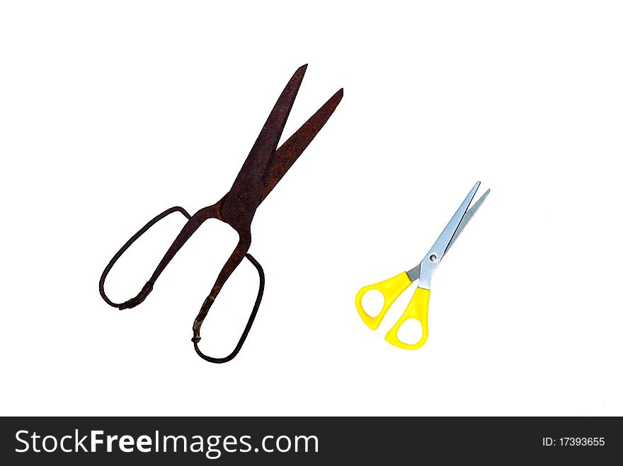 A couple of scissors - vintage and modern, isolated on white background. A couple of scissors - vintage and modern, isolated on white background