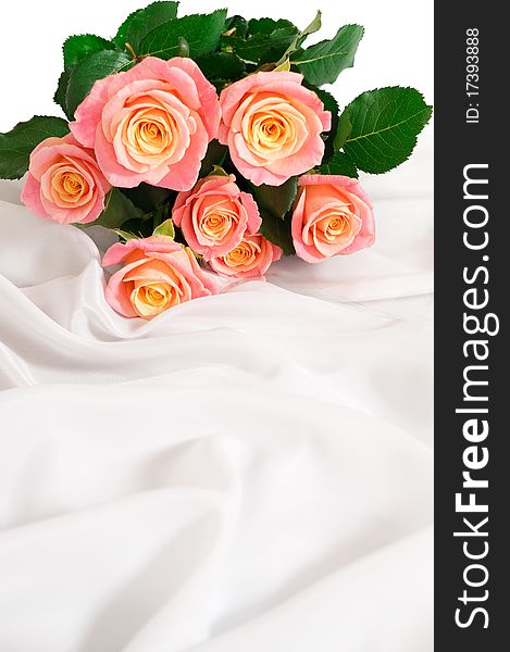 Beautiful bouquet of roses on a white drapery. Beautiful bouquet of roses on a white drapery.