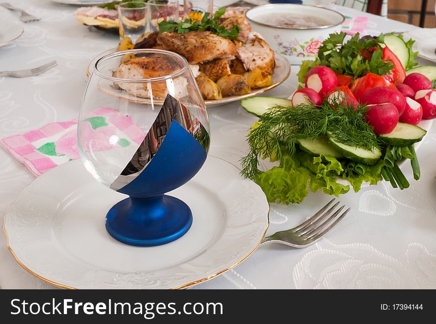 The prepared meat, fish and vegetables on a dining table. The prepared meat, fish and vegetables on a dining table.