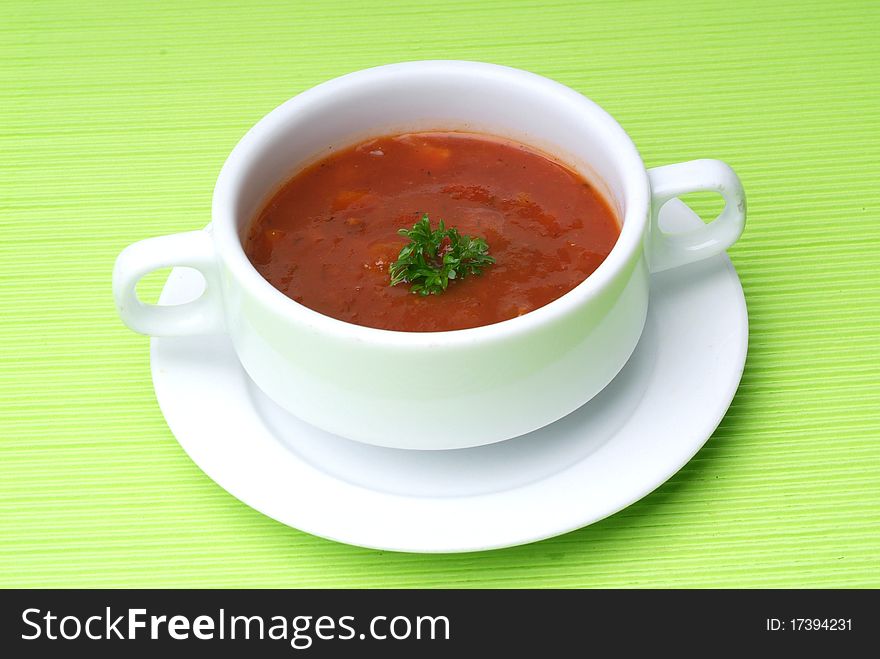 Tomato soup with basil leaf