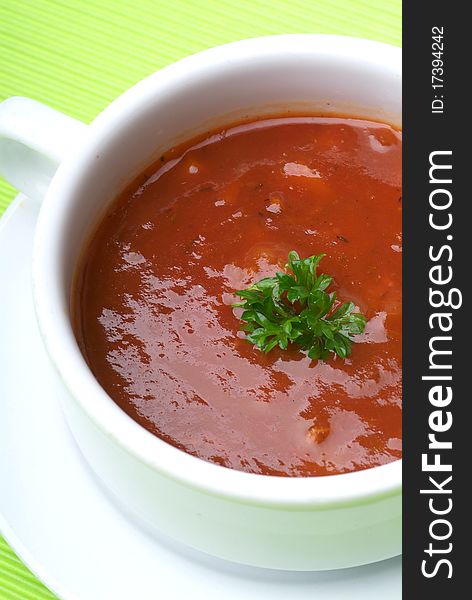 Tomato soup with basil leaf