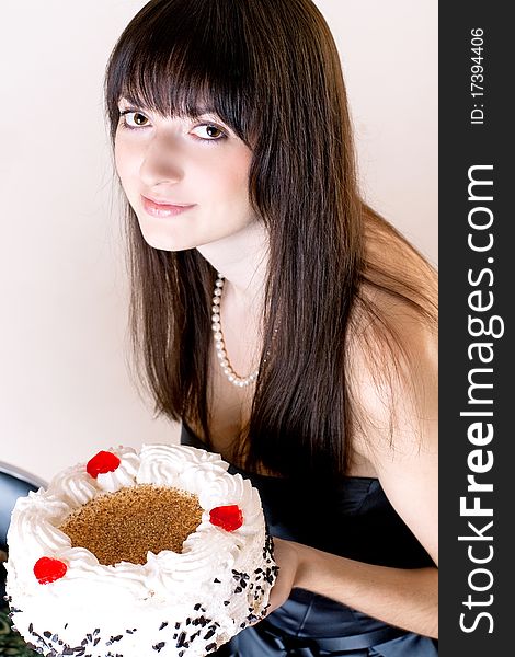 Young beauty woman with sweet cake