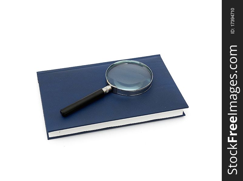 Magnifier and book isolated on a white background