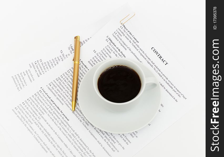 White cup of cappuccino on document background