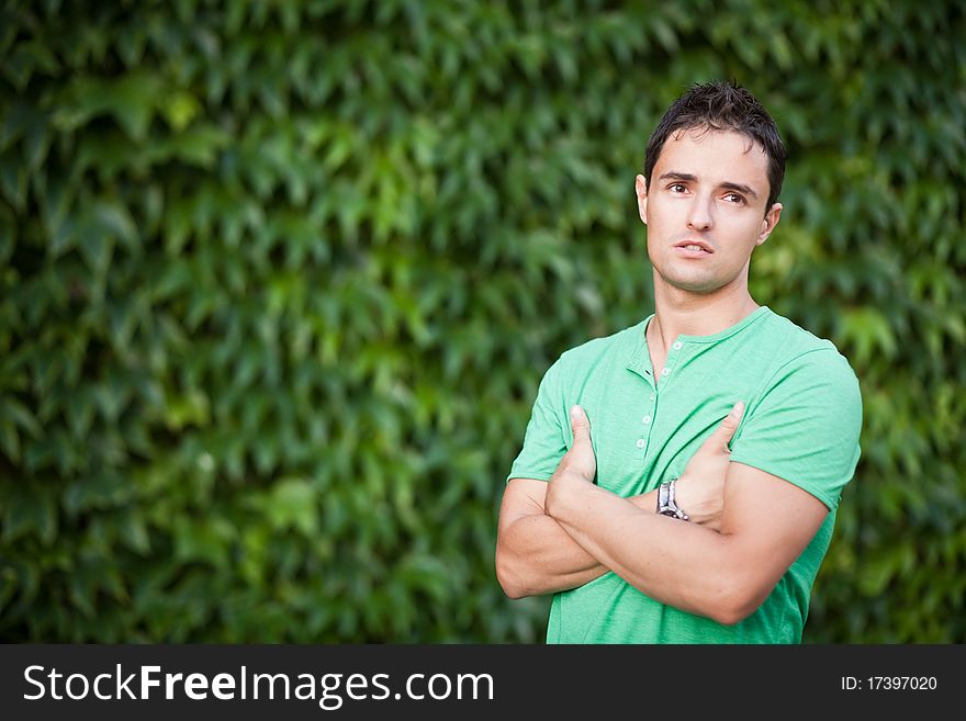 Portrait of a casual handsome man outdoors