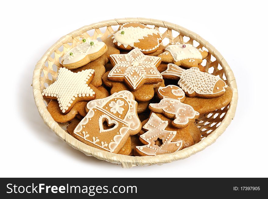 Various shapes of christmas gingerbread decorated with white topping