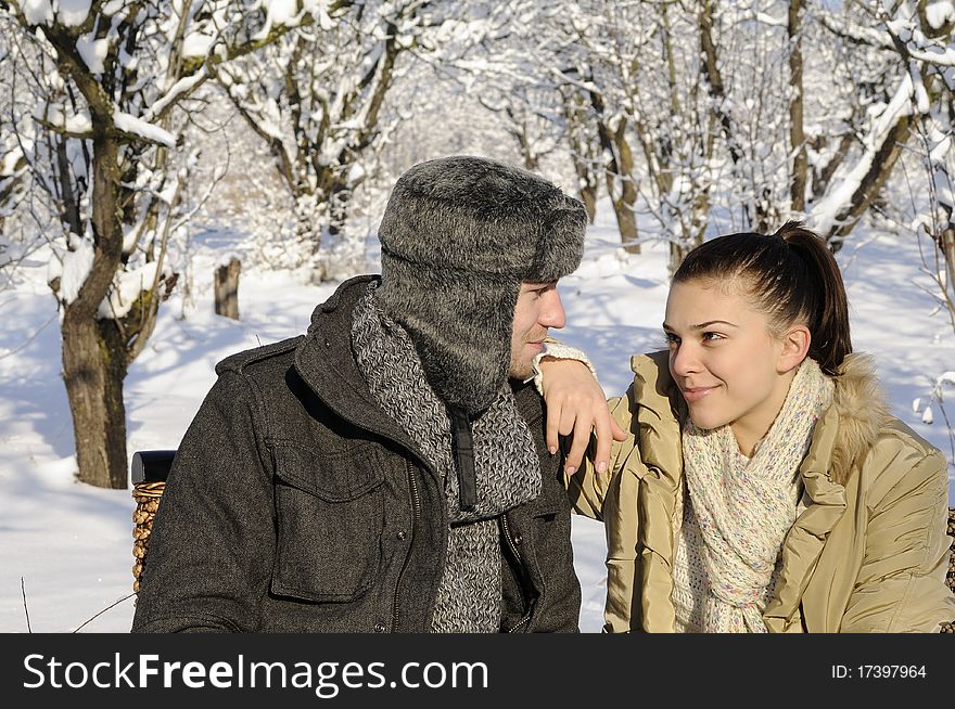 Young man and woman enjoying winter season. Young man and woman enjoying winter season
