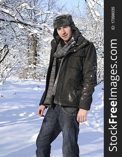 Young model presenting in nature winter collection. Young model presenting in nature winter collection