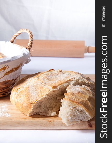 Fresh cooking bread on the wooden desk. Fresh cooking bread on the wooden desk