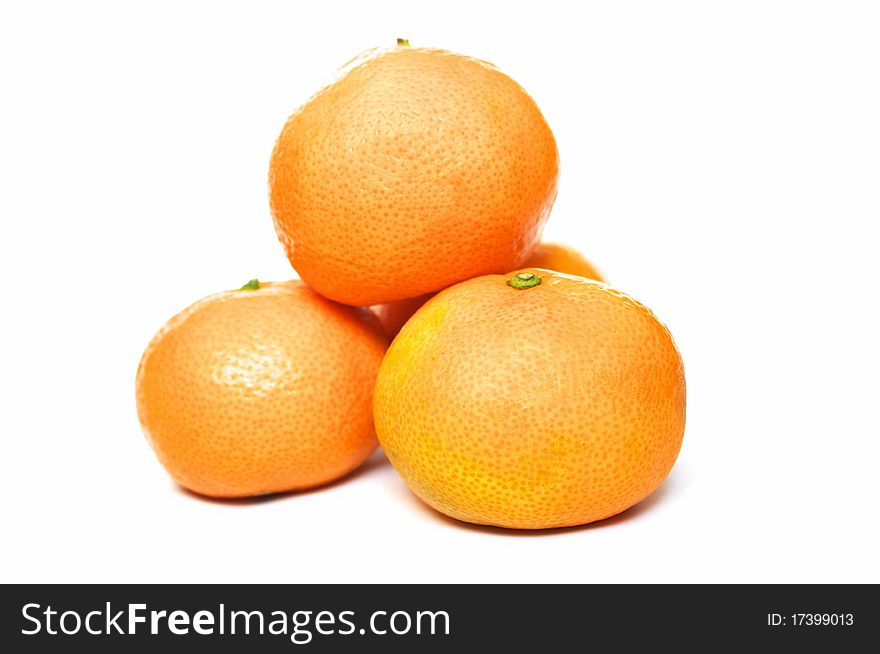 Photo of the tangerines on white background