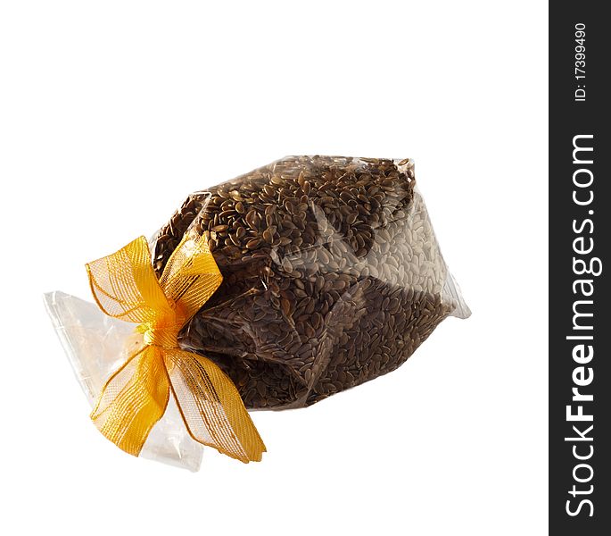 A bag of sesame seeds on a white background