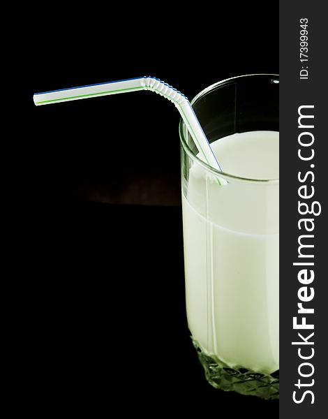 Drink milk on a black background