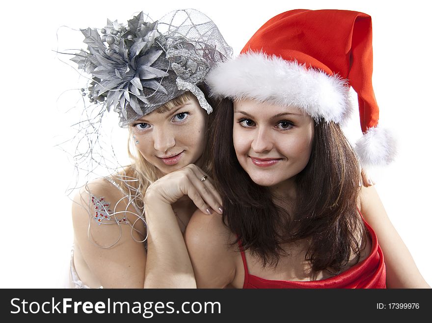 Two beautiful young friend girl celebrate New Year. Isolated on white. Two beautiful young friend girl celebrate New Year. Isolated on white.