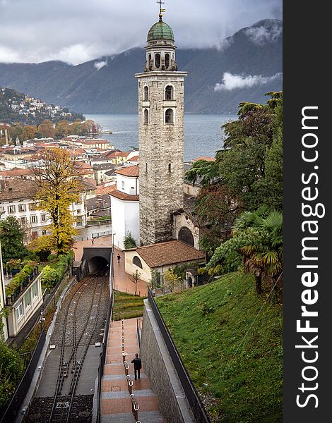 Switzerland. View of Cathedral of Saint Lawrence in Italian: di San Lorenzo and Lake Lugano. Switzerland. View of Cathedral of Saint Lawrence in Italian: di San Lorenzo and Lake Lugano