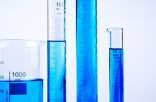 Laboratory Equipment With Blue Liquid Inside On White Background Stock Image