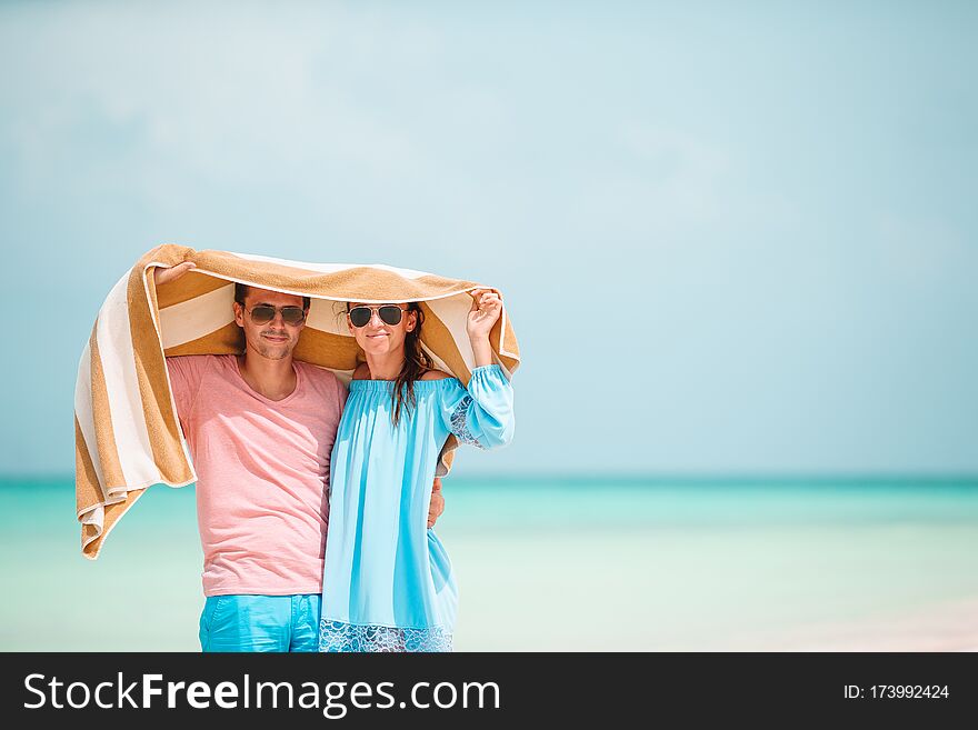 Young happy couple have fun on summer tropical vacation. Young happy couple have fun on summer tropical vacation