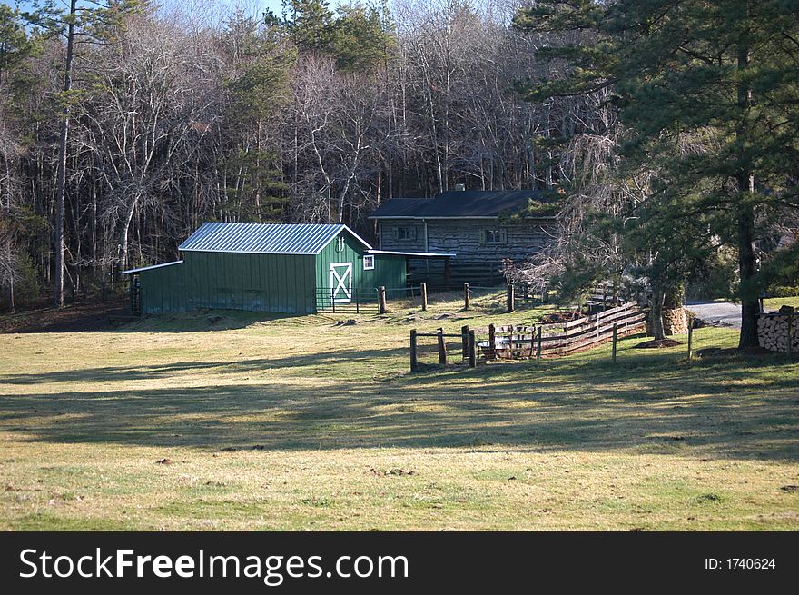 Farmland in rural North Carolina with a barn on the meadow