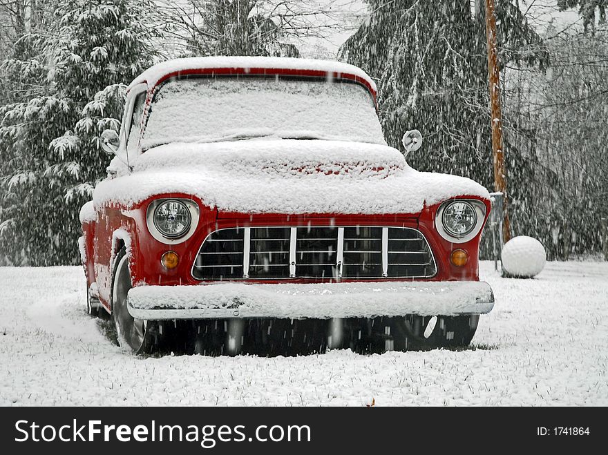 Custom 1955 Chevy pickup in the snow. Custom 1955 Chevy pickup in the snow