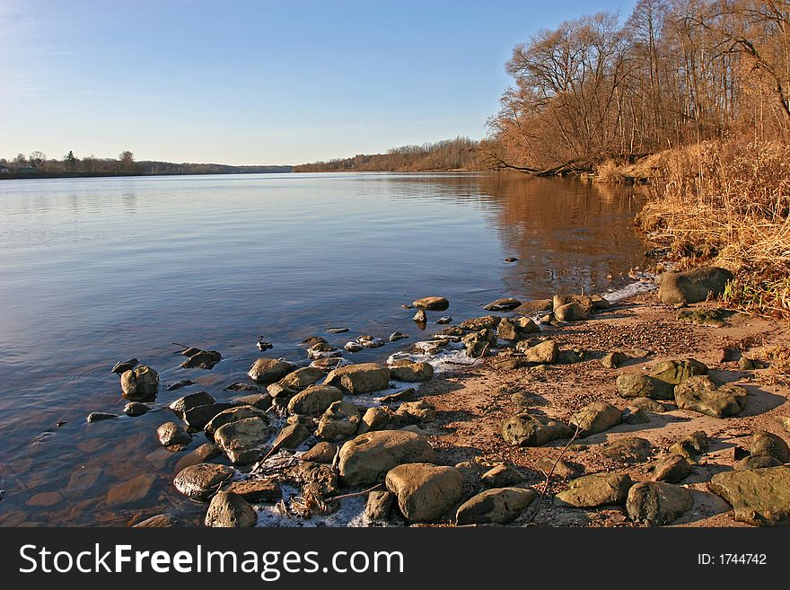 Quiet cove and autumn colors of the Daugava River near Ogre (Latvia). Quiet cove and autumn colors of the Daugava River near Ogre (Latvia).