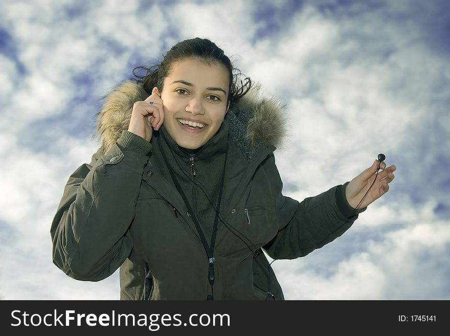 Beautiful Young Girl Listening Music