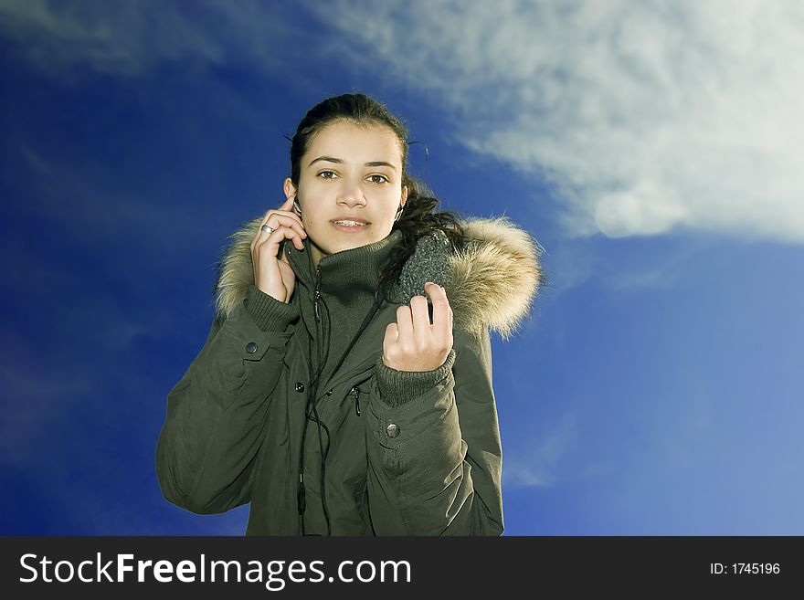 Beautiful Young Girl Listening Music