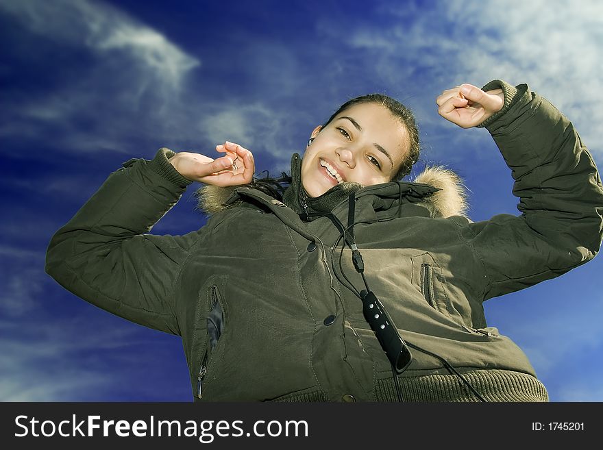 Beautiful Young Girl Listening Music