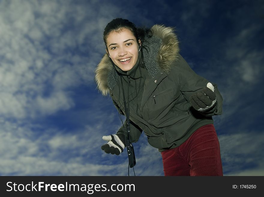 Young, beautiful and happy girl with mp3 player. Young, beautiful and happy girl with mp3 player