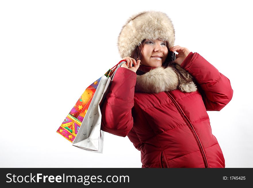 Attractive woman with shoppin bags on white background. Attractive woman with shoppin bags on white background