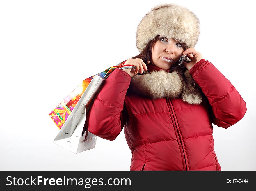 Attractive woman with shoppin bags on white background. Attractive woman with shoppin bags on white background