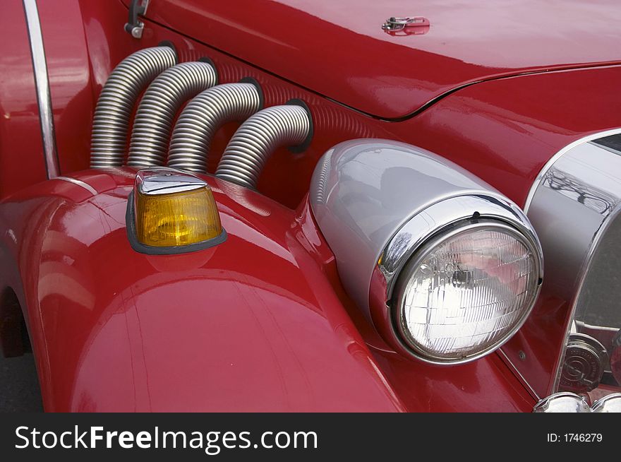 Red retro car. Detail. Close-up.