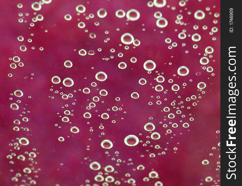 Magenta bubbles texture. Can be used to depict fizzy liquid, or droplets. Magenta bubbles texture. Can be used to depict fizzy liquid, or droplets