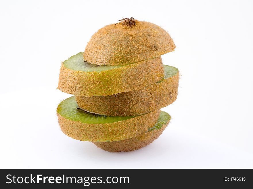 Kiwi fruit, two, one whole fruit and one sliced in a half. Isolated on white. Kiwi fruit, two, one whole fruit and one sliced in a half. Isolated on white