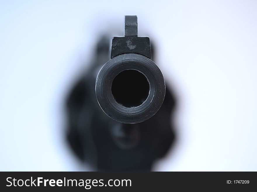 a handgun and a white background