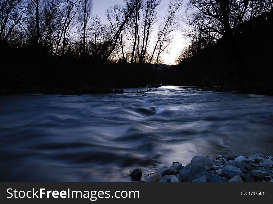 Silky flowing river in the mountains. Silky flowing river in the mountains