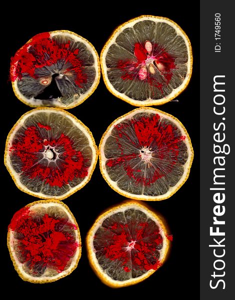 Lemon slices with red dye. Lemon slices with red dye