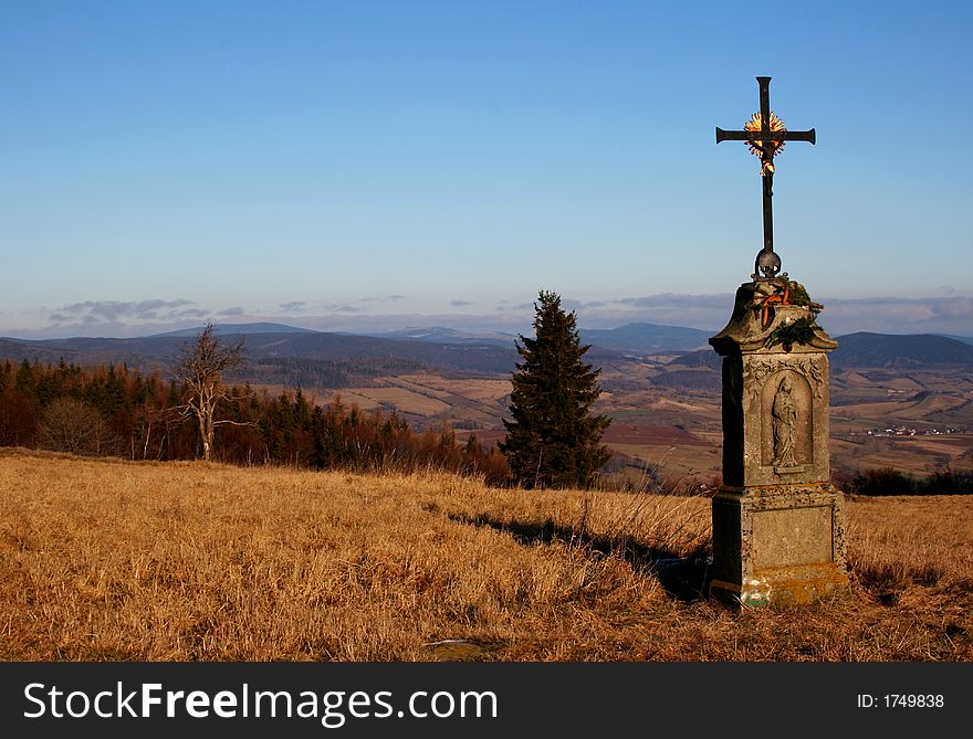 Memorial with crucifix on Giant mountains in the Czech Republic. Memorial with crucifix on Giant mountains in the Czech Republic