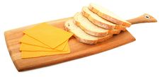 Bread And Cheese On Bread Paddle Royalty Free Stock Photos