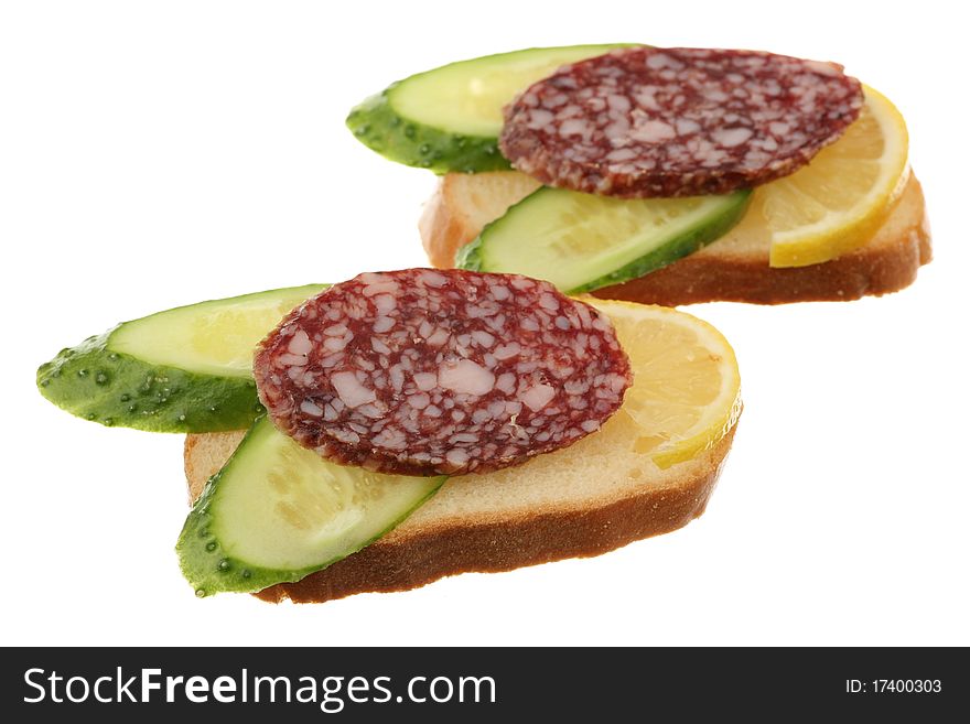 Two sandwiches are isolated on a white background