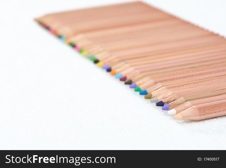 A set of color pencil lined in a fence arrangement. A set of color pencil lined in a fence arrangement.