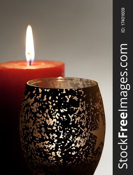 Few burning candle over abstract backgrounds