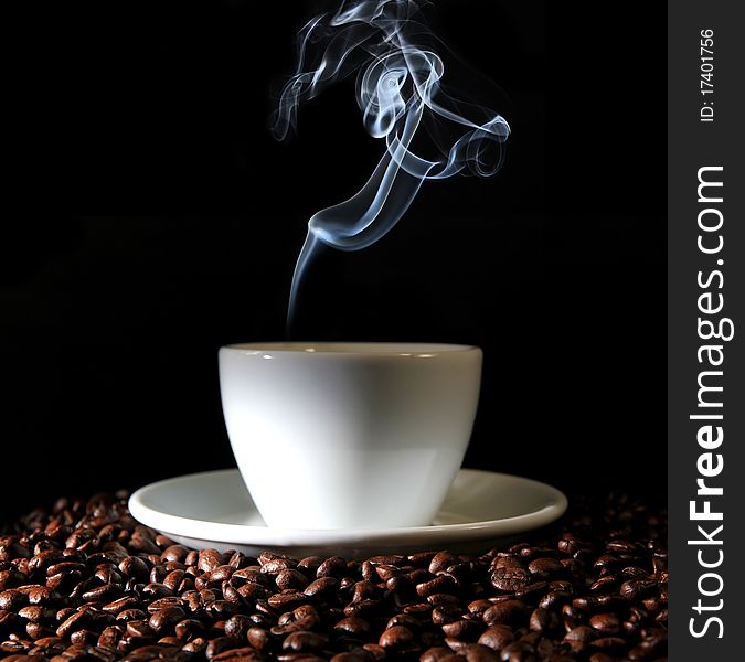 Studio photo of coffee cup with steam