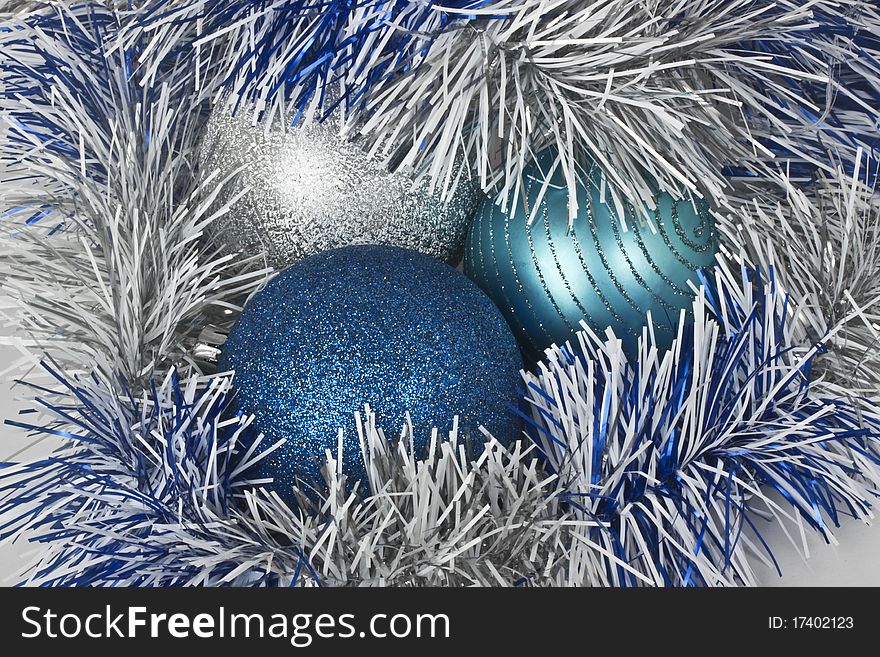 Christmas balls and blue paper streamer