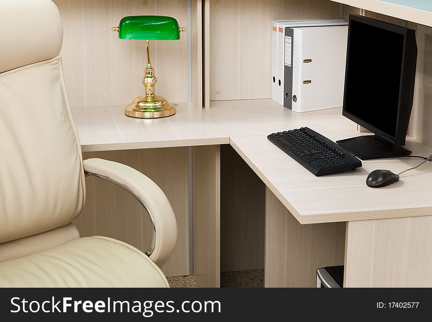 White leather armchair in a modern office