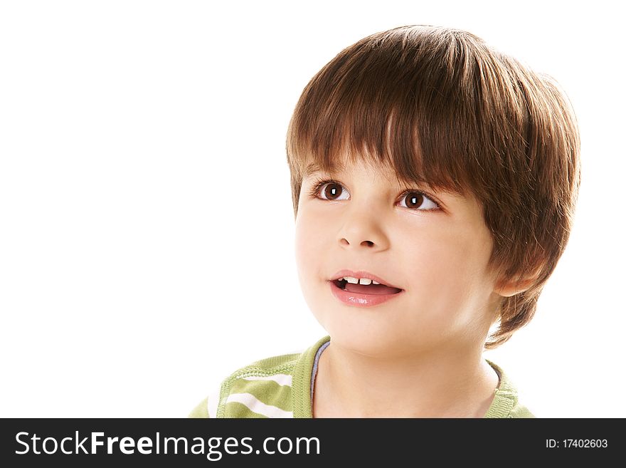 Portrait of happy little smiling boy looking up on white background. Portrait of happy little smiling boy looking up on white background