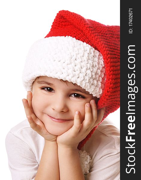 Portrai of happy smiling beautiful little boy in hat of Santa Claus isolated on white background. Portrai of happy smiling beautiful little boy in hat of Santa Claus isolated on white background