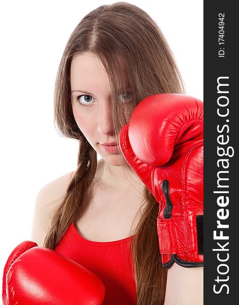 Woman wearing boxing gloves over white background