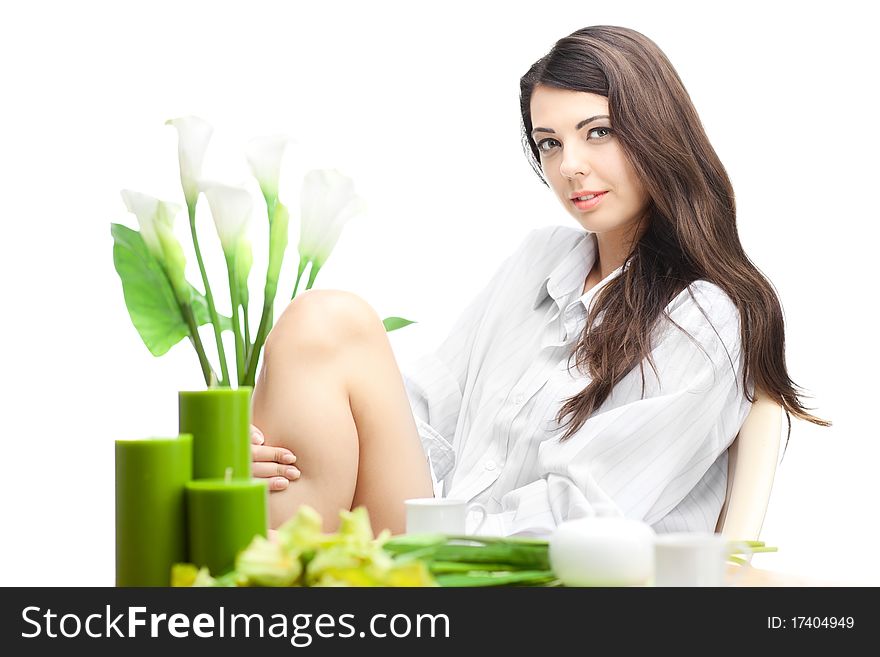 Woman dirinking tea smiling and looking at camera wearing formal clothes. Woman dirinking tea smiling and looking at camera wearing formal clothes