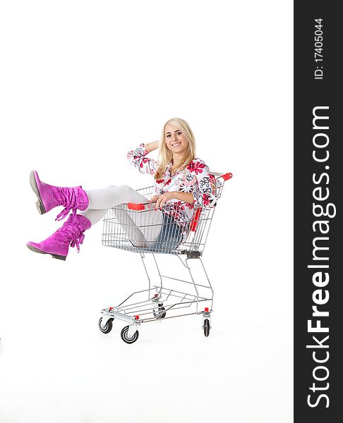 Beautiful woman with cart over white background. Beautiful woman with cart over white background