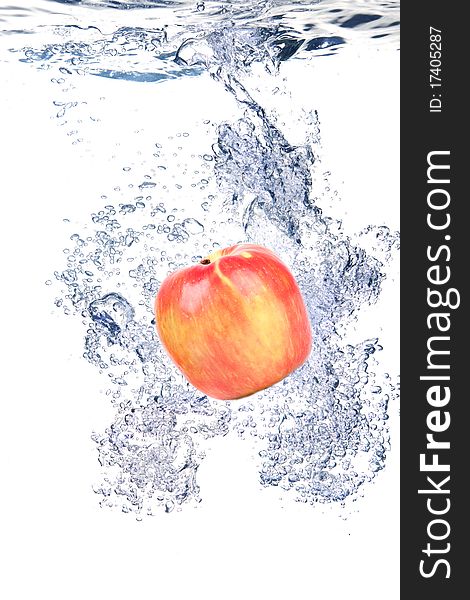 Apple water splash on white background